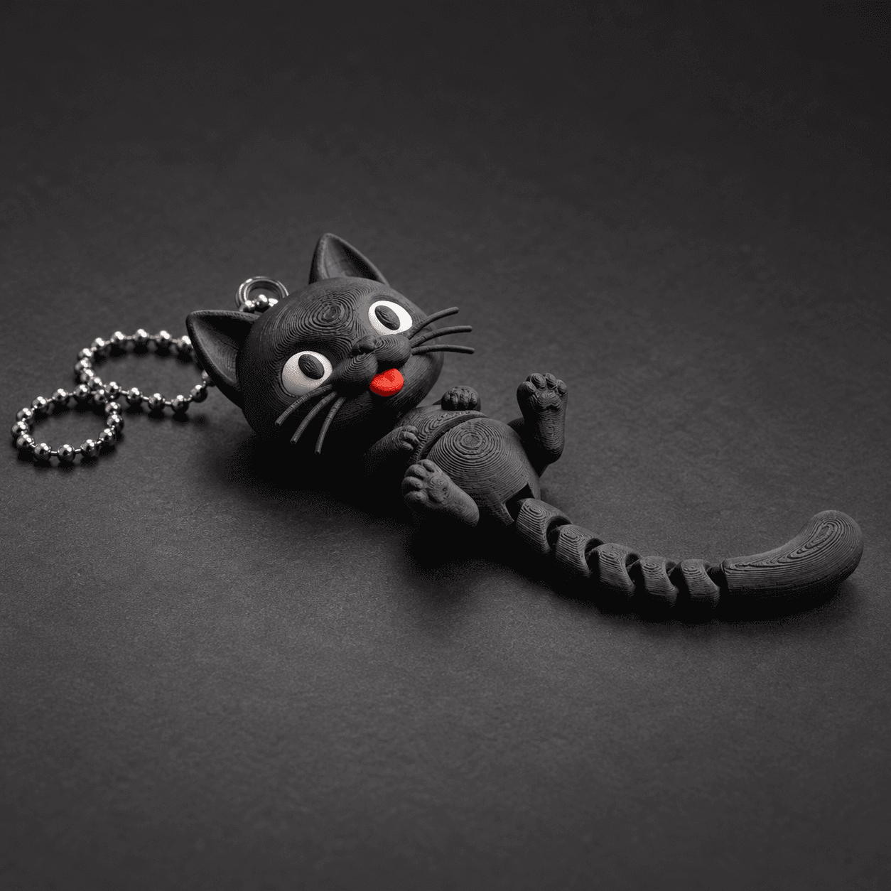 Articulated cat keychain